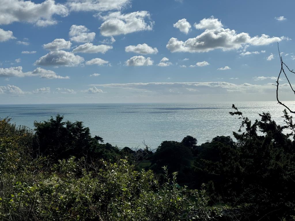 Lot: 59 - FREEHOLD GROUND RENTS FOR EXTENSIVE CHALET SITE - Sea view from Chalets